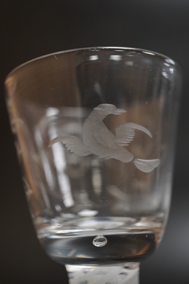 A double series opaque twist stem firing glass, with wheel engraved bowl - 11.5cm high